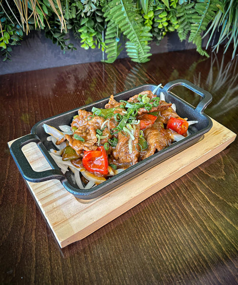 Sizzler carne de vaca com molho de ostra
